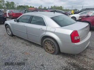 2008 Chrysler 300 Touring with VIN 2C3KA53G48H309834, listed as a IAAI auction lot 42200833 with 209,198 mi miles. Bid and sale history available at carsss.com. Image 3.