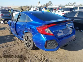 2018 Honda Civic Si with VIN 2HGFC1E56JH700325, listed as a IAAI auction lot 42007770 with 101,386 mi miles and . Bid and sale history available at DreamBid. Image 3.