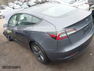 2023 Tesla Model 3 with VIN 5YJ3E1EA7PF642913, listed as a IAAI auction lot 41898249 with 26,394 mi miles. Bid and sale history available at carsss.com. Image 3.