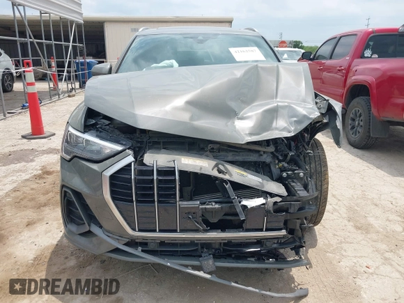 2021 Audi Q3 S line Premium z VIN WA1DECF33M1040282, wystawiony jako IAAI lot #42162587 z przebiegiem 90 509 mil mil oraz . Historia ofert i sprzedaży dostępna na DreamBid. Obrazek 13.