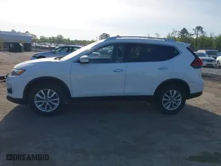 2017 Nissan Rogue SV with VIN KNMAT2MV2HP571019, listed as a IAAI auction lot 42074667 with 164,965 mi miles. Bid and sale history available at carsss.com. Image 14.