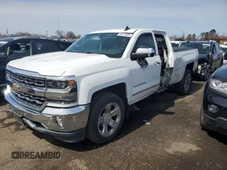 2017 Chevrolet Silverado 1500 LTZ with VIN 1GCVKSECXHZ305981, listed as a Copart auction lot 51273425 with 77,465 mi miles and Salvage Title. Bid and sale history available at DreamBid. Image 1.