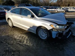2013 Ford Fusion SE Hybrid with VIN 3FA6P0LUXDR244609, listed as a Copart auction lot 88335515 with Not Provided miles and Salvage Title. Bid and sale history available at DreamBid. Image 4.