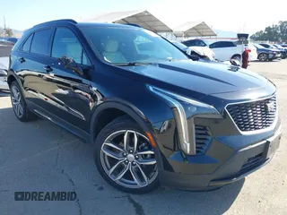 2020 Cadillac XT4 FWD Sport z VIN 1GYFZER49LF021475, wystawiony jako IAAI lot #41962892 z przebiegiem 41 603 mil mil oraz . Historia ofert i sprzedaży dostępna na DreamBid. Obrazek 1.