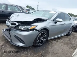 2018 Toyota Camry LE z VIN 4T1B11HK3JU129549, wystawiony jako IAAI lot #42159243 z przebiegiem 76 299 mil mil oraz . Historia ofert i sprzedaży dostępna na DreamBid. Obrazek 19.