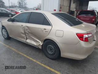 2012 Toyota Camry L with VIN 4T4BF1FK9CR164657, listed as a IAAI auction lot 40900844 with 113,666 mi miles and . Bid and sale history available at DreamBid. Image 3.