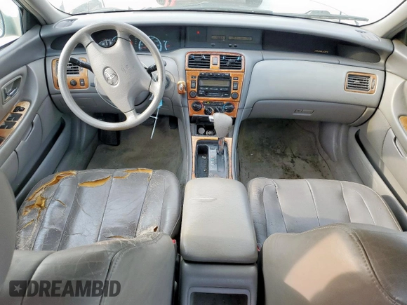2002 Toyota Avalon XL z VIN 4T1BF28B22U200555, wystawiony jako Copart lot #54544265 z przebiegiem 146 031 mil mil oraz Czysty tytuł • Clean title. Historia ofert i sprzedaży dostępna na DreamBid. Obrazek 8.