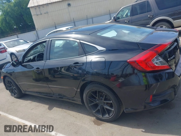 2019 Honda Civic Sedan LX with VIN 2HGFC2F61KH510012, listed as a IAAI auction lot 42073212 with 86,487 mi miles. Bid and sale history available at carsss.com. Image 14.