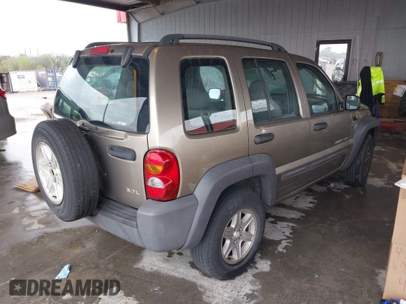 2003 Jeep Liberty Sport with VIN 1J4GK48K13W633818, listed as a IAAI auction lot 41962552 with 217,884 mi miles and . Bid and sale history available at DreamBid. Image 4.