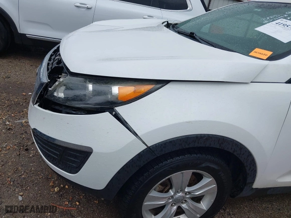 2012 Kia Sportage LX with VIN KNDPB3A2XC7283612, listed as a IAAI auction lot 41957810 with 165,899 mi miles. Bid and sale history available at carsss.com. Image 6.