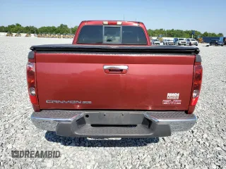 2011 GMC Canyon z VIN 1GTE5NF93B8100138, wystawiony jako Copart lot #53719935 z przebiegiem 94 730 mil mil oraz Czysty tytuł • Clean title. Historia ofert i sprzedaży dostępna na DreamBid. Obrazek 6.