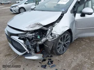 2019 Toyota Corolla Hatchback SE with VIN JTNK4RBE6K3064695, listed as a IAAI auction lot 41296362 with 56,282 mi miles. Bid and sale history available at carsss.com. Image 6.