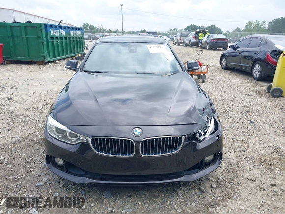 2014 BMW 4 Series 435i with VIN WBA3T3C50EJ876997, listed as a IAAI auction lot 42406299 with 115,048 mi miles and . Bid and sale history available at DreamBid. Image 12.