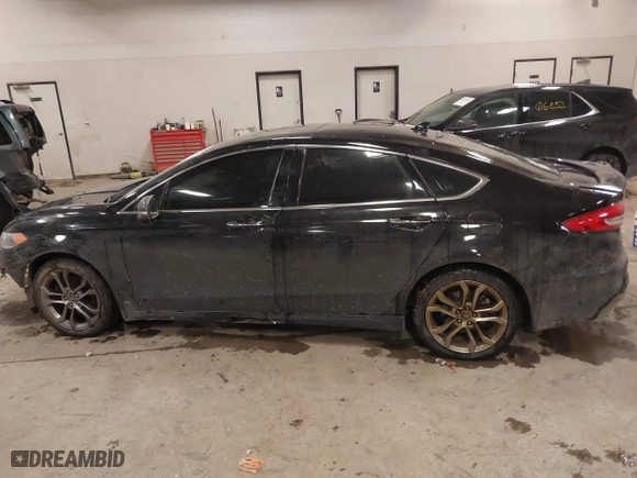 2020 Ford Fusion Hybrid Titanium with VIN 3FA6P0RU8LR141355, listed as a IAAI auction lot 41417807 with 61,288 mi miles. Bid and sale history available at carsss.com. Image 14.