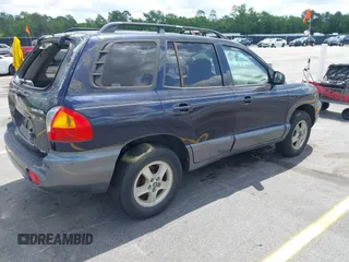 2004 Hyundai Santa Fe GLS with VIN KM8SC73D74U608244, listed as a IAAI auction lot 42142464 with 138,537 mi miles. Bid and sale history available at carsss.com. Image 4.