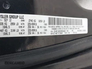 2013 Chrysler Town & Country Touring with VIN 2C4RC1BG5DR554662, listed as a IAAI auction lot 41833006 with 143,626 mi miles and . Bid and sale history available at DreamBid. Image 9.