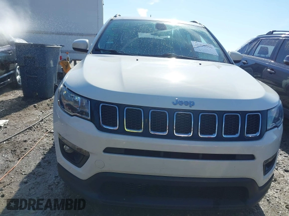 2019 Jeep Compass Altitude z VIN 3C4NJCBB0KT743170, wystawiony jako IAAI lot #41490256 z przebiegiem 93 319 mil mil oraz . Historia ofert i sprzedaży dostępna na DreamBid. Obrazek 13.
