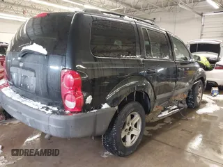 2005 Dodge Durango SXT with VIN 1D4HB38N15F610902, listed as a IAAI auction lot 41599584 with 175,661 mi miles and . Bid and sale history available at DreamBid. Image 4.