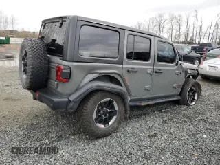 2018 Jeep Wrangler Unlimited Rubicon with VIN 1C4HJXFNXJW196460, listed as a Copart auction lot 49681715 with 71,187 mi miles and Salvage title. Bid and sale history available at DreamBid. Image 3.