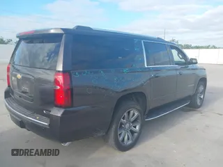 2018 Chevrolet Suburban Premier with VIN 1GNSCJKC5JR135265, listed as a IAAI auction lot 42028935 with 136,382 mi miles and . Bid and sale history available at DreamBid. Image 4.