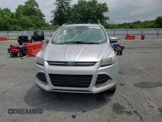 2013 Ford Escape Titanium with VIN 1FMCU9J9XDUB88989, listed as a Copart auction lot 64994445 with 192,833 mi miles and Salvage title. Bid and sale history available at DreamBid. Image 13.