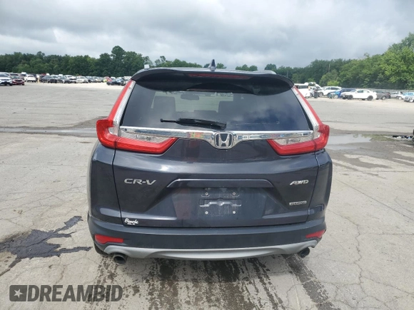 2018 Honda CR-V Touring with VIN 2HKRW2H91JH688325, listed as a Copart auction lot 63619555 with 124,962 mi miles and Salvage title. Bid and sale history available at DreamBid. Image 6.