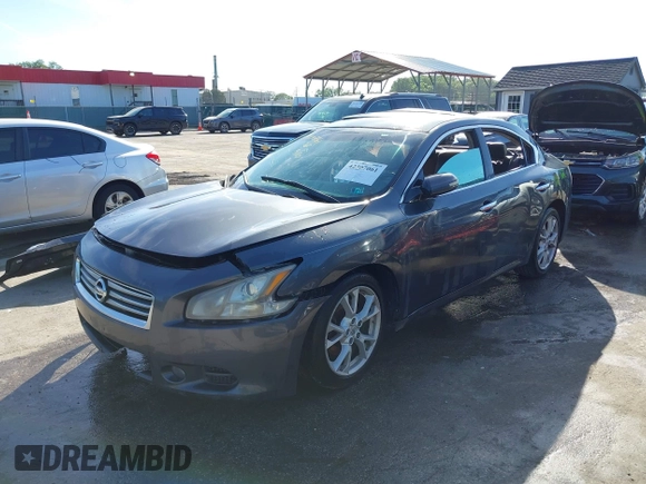 2012 Nissan Maxima S z VIN 1N4AA5AP2CC868911, wystawiony jako IAAI lot #42307061 z przebiegiem 163 159 mil mil oraz . Historia ofert i sprzedaży dostępna na DreamBid. Obrazek 2.