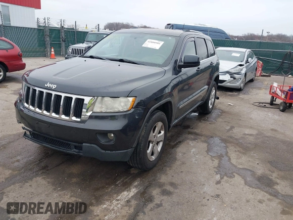 2013 Jeep Grand Cherokee Laredo with VIN 1C4RJFAG9DC506238, listed as a IAAI auction lot 41800981 with 172,676 mi miles. Bid and sale history available at carsss.com. Image 18.
