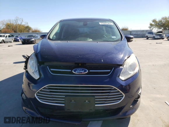 2016 Ford C-Max Energi SEL with VIN 1FADP5CU8GL114965, listed as a Copart auction lot 77697363 with 87,085 mi miles. Bid and sale history available at carsss.com. Image 5.