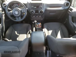2018 Jeep Wrangler Unlimited Sport S with VIN 1C4BJWDG8JL814090, listed as a Copart auction lot 49155145 with 74,875 mi miles and Salvage Title. Bid and sale history available at DreamBid. Image 8.