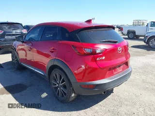 2016 Mazda CX-3 Grand Touring with VIN JM1DKBD71G0112329, listed as a IAAI auction lot 41662610 with 145,329 mi miles. Bid and sale history available at carsss.com. Image 3.