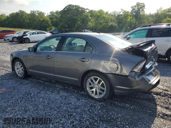 2012 Ford Fusion SEL with VIN 3FAHP0JA7CR387288, listed as a Copart auction lot 56968885 with 169,802 mi miles and Salvage title. Bid and sale history available at DreamBid. Image 2.