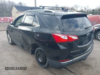 2018 Chevrolet Equinox Premier with VIN 2GNAXWEX6J6302935, listed as a IAAI auction lot 42065883 with 61,983 mi miles and . Bid and sale history available at carsss.com. Image 3.