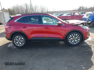 2021 Ford Escape Titanium with VIN 1FMCU9J9XMUA70800, listed as a IAAI auction lot 41717946 with Not Provided miles and . Bid and sale history available at carsss.com. Image 12.