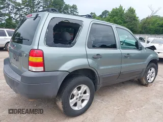 2006 Ford Escape XLT with VIN 1FMYU03146KD35945, listed as a IAAI auction lot 42337712 with 159,833 mi miles and . Bid and sale history available at DreamBid. Image 4.