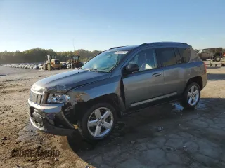 2012 Jeep Compass Limited with VIN 1C4NJCCB7CD523935, listed as a Copart auction lot 76399974 with 172,846 mi miles and Salvage Title. Bid and sale history available at DreamBid. Image 1.