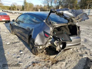 2019 Tesla Model 3 Long Range with VIN 5YJ3E1EB5KF195256, listed as a Copart auction lot 89077375 with 55,719 mi miles and Salvage Title. Bid and sale history available at carsss.com. Image 2.