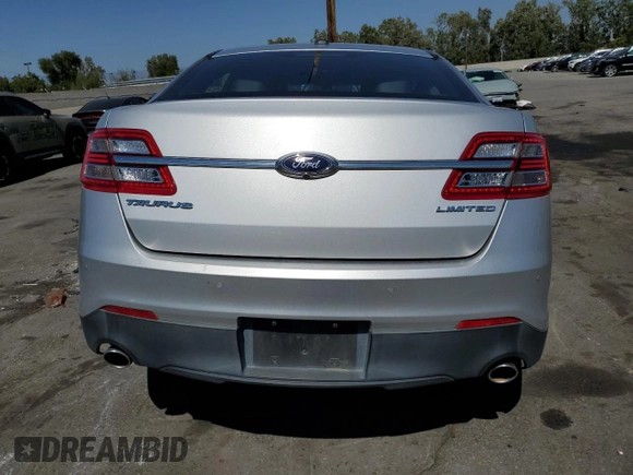 2015 Ford Taurus Limited с VIN 1FAHP2F84FG106058, выставлен на аукционе Copart как лот 57621355 с пробегом 130 582 миль миль и Списание • Salvage title. История ставок и продаж доступна на DreamBid. Изображение 6.
