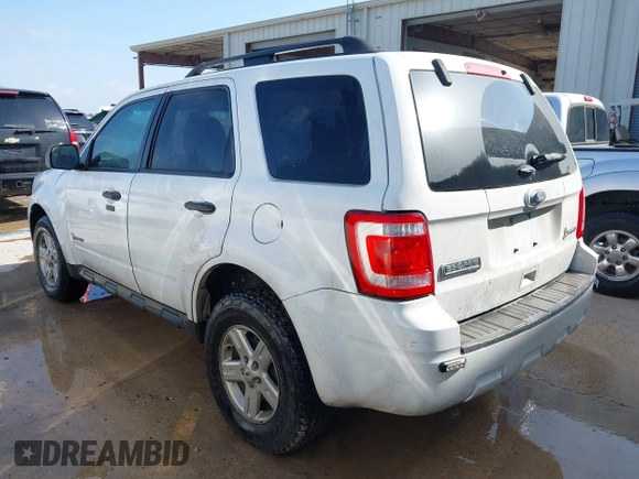 2011 Ford Escape Hybrid with VIN 1FMCU4K3XBKA75758, listed as a IAAI auction lot 42753145 with 170,554 mi miles and . Bid and sale history available at DreamBid. Image 3.