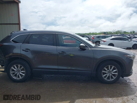 2016 Mazda CX-9 Sport with VIN JM3TCABY5G0122478, listed as a IAAI auction lot 42115795 with 134,980 mi miles and . Bid and sale history available at DreamBid. Image 13.