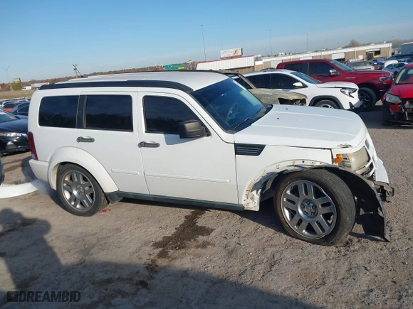 2011 Dodge Nitro Heat with VIN 1D4PT4GK0BW582589, listed as a IAAI auction lot 41015035 with 130,098 mi miles. Bid and sale history available at carsss.com. Image 14.