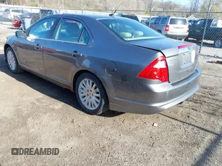 2010 Ford Fusion Hybrid z VIN 3FADP0L35AR423330, wystawiony jako IAAI lot #41972619 z przebiegiem 154 026 mil mil oraz . Historia ofert i sprzedaży dostępna na DreamBid. Obrazek 3.