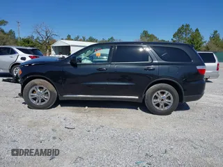 2013 Dodge Durango SXT with VIN 1C4RDJAG2DC617983, listed as a IAAI auction lot 41805992 with 210,560 mi miles and . Bid and sale history available at carsss.com. Image 14.