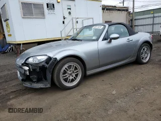 2013 Mazda MX-5 Miata Sport z VIN JM1NC2JF8D0232492, wystawiony jako Copart lot #50651025 z przebiegiem 57 235 mil mil oraz Szkoda całkowita • Salvage title. Historia ofert i sprzedaży dostępna na DreamBid. Obrazek 1.