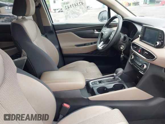2019 Hyundai Santa Fe SE z VIN 5NMS2CADXKH005960, wystawiony jako IAAI lot #42341142 z przebiegiem 71 617 mil mil oraz . Historia ofert i sprzedaży dostępna na DreamBid. Obrazek 5.
