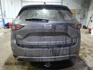 2021 Mazda CX-5 Grand Touring with VIN JM3KFADM5M0428282, listed as a Copart auction lot 42567825 with 33,763 mi miles and Salvage Title. Bid and sale history available at carsss.com. Image 6.