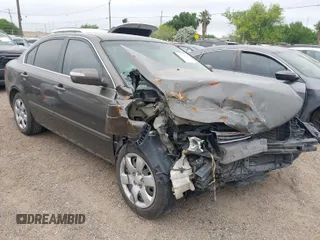 2009 Kia Optima LX with VIN KNAGE228X95299444, listed as a IAAI auction lot 41953241 with 201,170 mi miles. Bid and sale history available at carsss.com. Image 1.