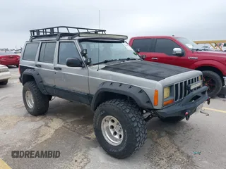 2001 Jeep Cherokee Sport z VIN 1J4FF48S01L548676, wystawiony jako IAAI lot #42408587 z przebiegiem 191 887 mil mil oraz . Historia ofert i sprzedaży dostępna na DreamBid. Obrazek 1.