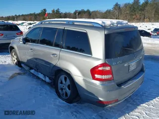 2011 Mercedes-Benz GL-Class GL 450 with VIN 4JGBF7BE3BA700323, listed as a IAAI auction lot 41586109 with 165,457 mi miles. Bid and sale history available at carsss.com. Image 3.