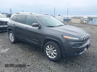 2015 Jeep Cherokee Limited with VIN 1C4PJMDS5FW550282, listed as a IAAI auction lot 41796297 with 96,374 mi miles. Bid and sale history available at carsss.com. Image 1.